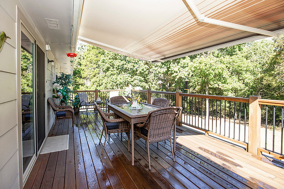 Upper deck with awning